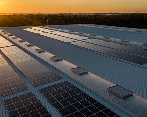 sun shining on solar panel roof