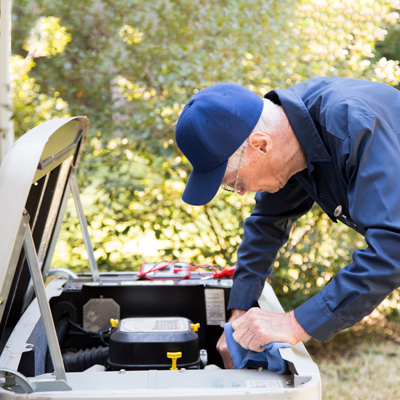 technician working on generator