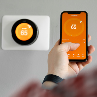 controlling smart thermostat on mobile phone